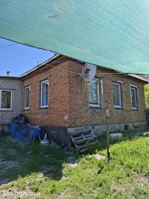 Продам кирпичный дом  на Славянском переулке 10